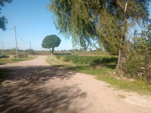 Venta Terreno con construcción camino a San Carlos