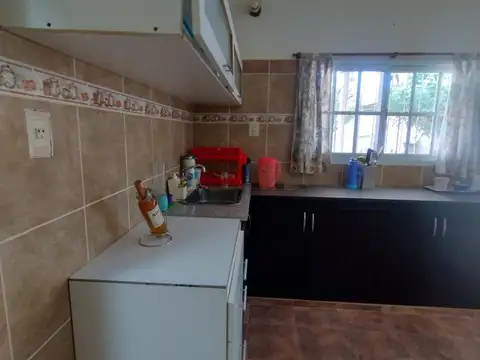 Casa 6 ambientes mas local comercial
