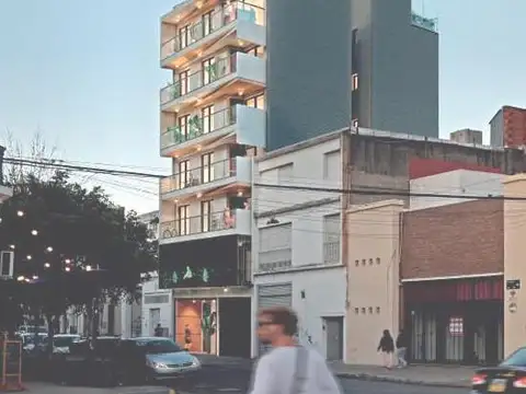 Departamento 2 dormitorios con parrilla en balcon.