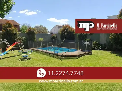 Espectacular Residencia con Amplio Jardín y Piscina en Zona Residencial - En venta