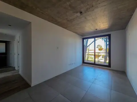 DEPARTAMENTO DE 2 DORMITORIOS CON PARRILLERO Y COCHERA EN FISHERTON