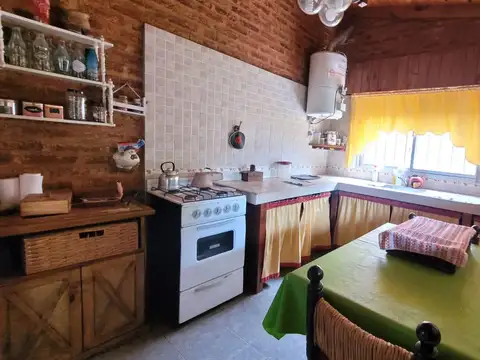 Casa 2 ambientes con 2 baños