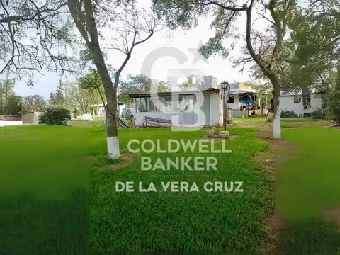 CASA EN RINCON POTRERO SOBRE EL RIO