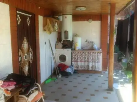 CASA 4 AMBIENTES CON COCHERA