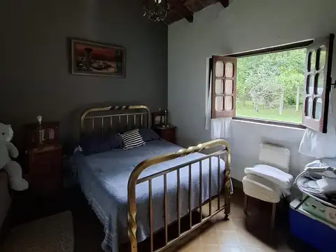Chacra de 6.000 m2 con casa de 4 dormitorios