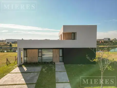 Casa en venta sobre lote a la laguna en  Barrio Vistas  Puertos