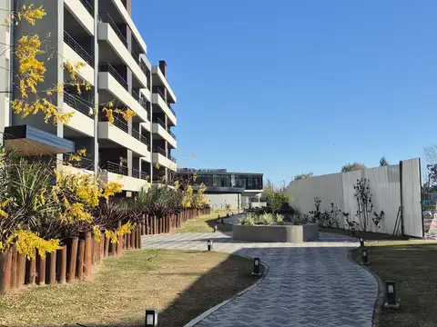 Acceso Oeste, distrito T 100