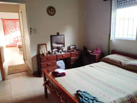 CASA MULTIFAMILIAR  CON 2 COCHERAS AL FRENTE