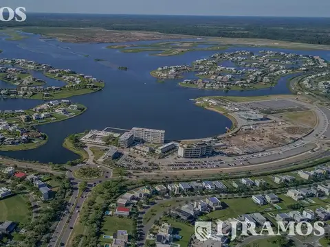 EXCELENTE LOTE AL LAGO EN EL BARRIO MARINAS DE PUERTOS DEL LAGO. ORIENTACION NORESTE.