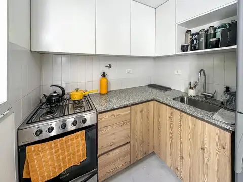 Casa tipo dúplex de pasillo con 1 dormitorio, patio y balcón