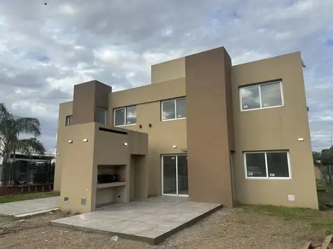 Venta duplex dos dormitorios patio parrillero cochera tierra de sueños 2