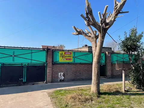 Casa en barrio en crecimiento