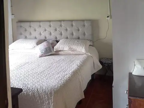 Casa en barrio en crecimiento