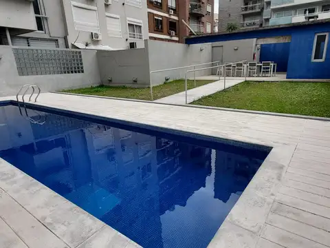 Depto de 2 amb con amplio balcón en 7mo piso con parrilla y amenities