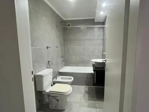 Monoambiente Alquiler Flores-Patio y amenities