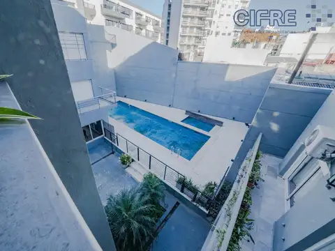 Departamento 3 Ambientes con Balcón terraza c/ parrilla y cochera fija cubierta.