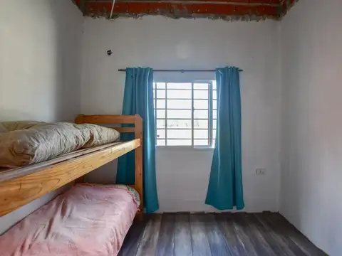 CASA EN VENTA EN PARQUE SICARDI 2 DORMITORIOS